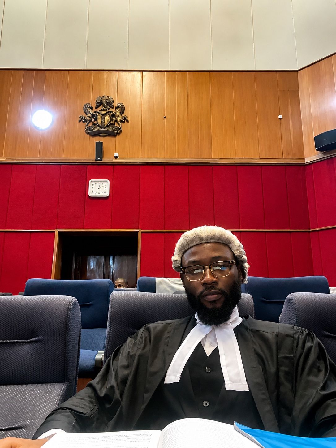 Prince Ezeabata Chibuzor in legal attire inside a courtroom